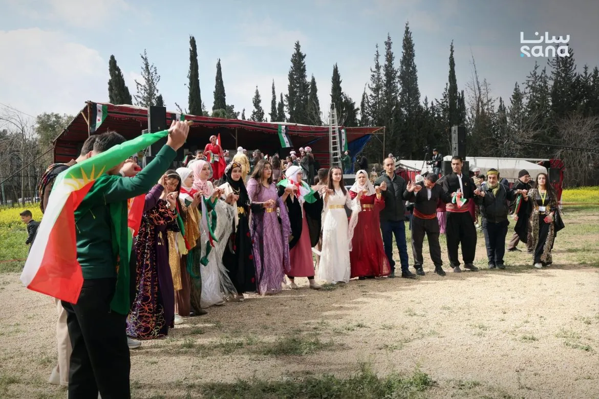 احتفالات النوروز بسوريا: بهجة رسمية بدمشق وتوتر بسبب إنزال العلم بكوباني